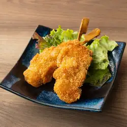 Two pork skewers