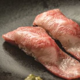 Two pieces of wagyu beef fatty sushi