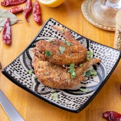 Fried chicken wings with spices