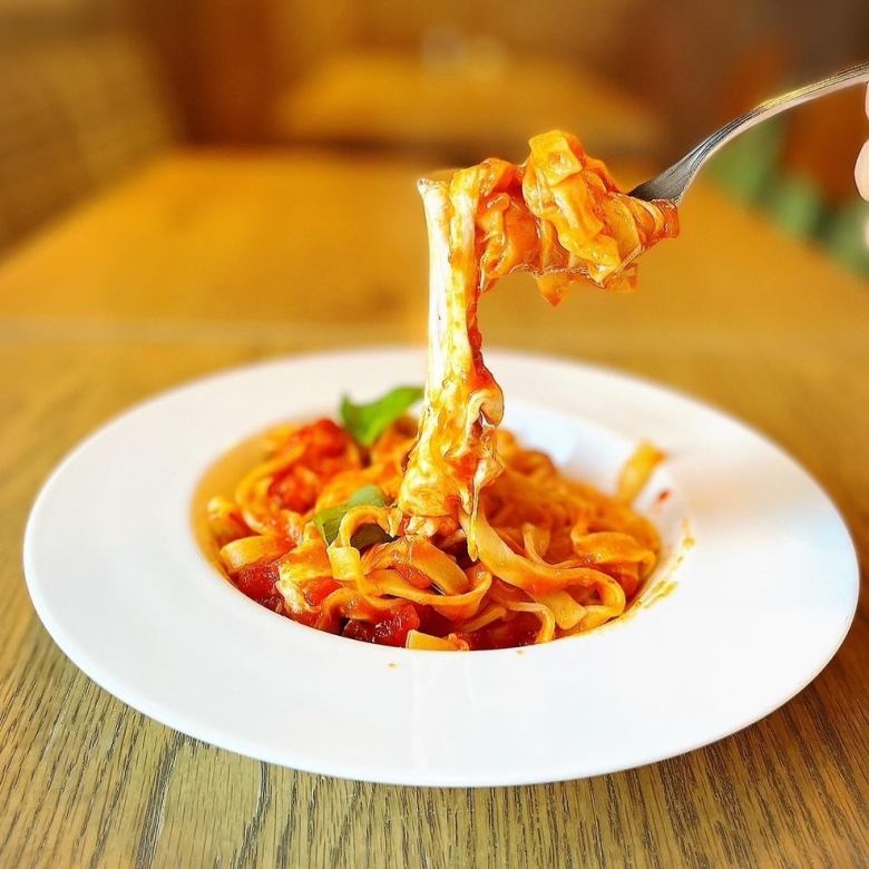 Tomato sauce with stringy mozzarella cheese