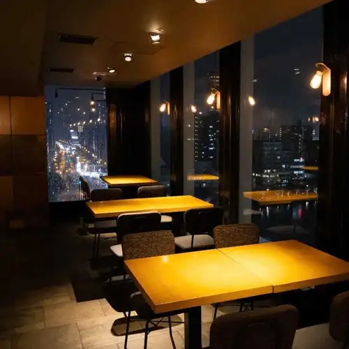 A blissful anniversary dinner overlooking the glittering city.