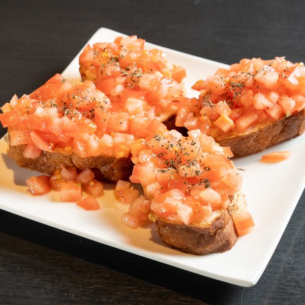 【当店オリジナル料理】ガーリックトーストにトマトが山盛り◆トクスケッタ980円(税込)