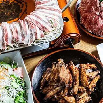 【宴會套餐】3小時暢飲套餐，內含本店特色菜白煮豬肉：5,500日圓（含稅）