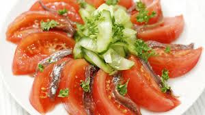 Marinated anchovies and tomatoes