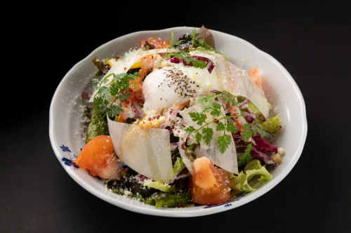 Caesar salad with plenty of cheese and fresh vegetables, served with soft-boiled egg (serves 2-3 people)