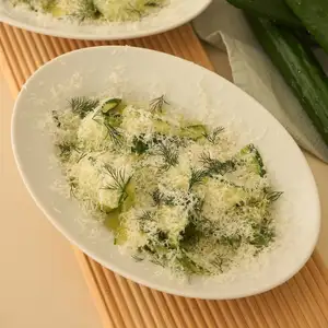 Cucumber marinade and grated Parmesan salad