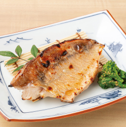 Grilled rockfish marinated in sake lees, served with seasonal vegetables and sesame dressing.