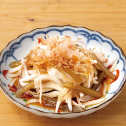 New onion and wakame stem with bonito flakes and ponzu sauce