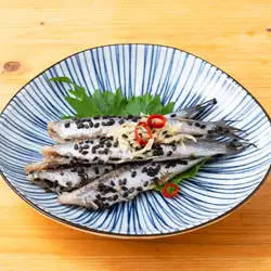 Sardines marinated in sesame seeds