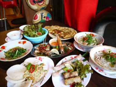 High Tam course/9 dishes including goikun (fresh spring rolls), pork and enoki skewers, and chicken pho/