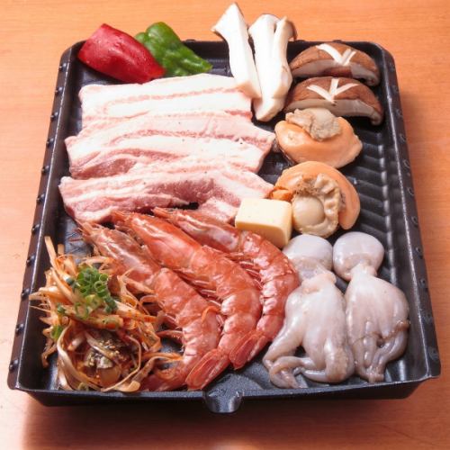 Grilled samgyeopsal with butter seafood
