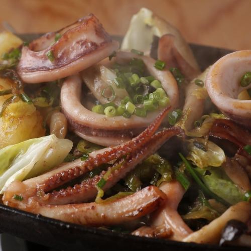 Grilled squid on an iron plate