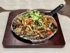Mongolian-style stir-fried udon noodles with lamb spare ribs (lamb)