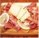 Assortment of 3 types of raw ham and salami