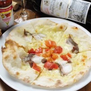 Sea bream and tomato anchovy pizza