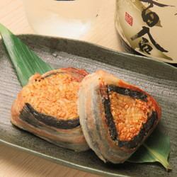 2 meat-wrapped rice balls