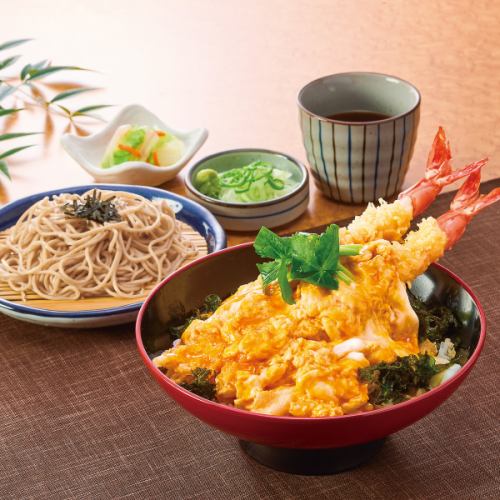 Large shrimp tempura rice bowl with fluffy egg and noodles