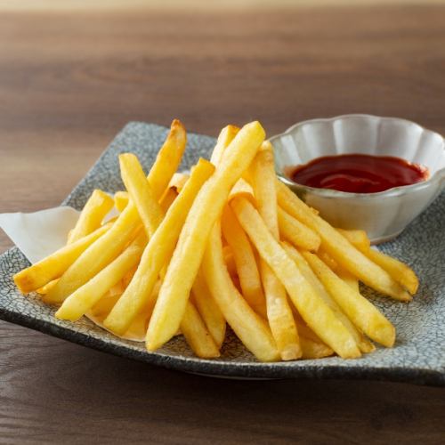 Freshly fried potato fries