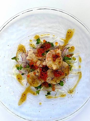 Seared salmon roe, large red shrimp and scallop carpaccio