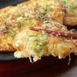 Grilled yam with grated cheese