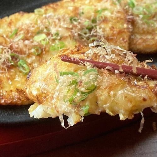 Grilled yam with grated cheese