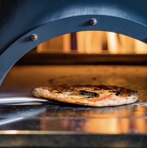 Bake in a real pizza kiln!