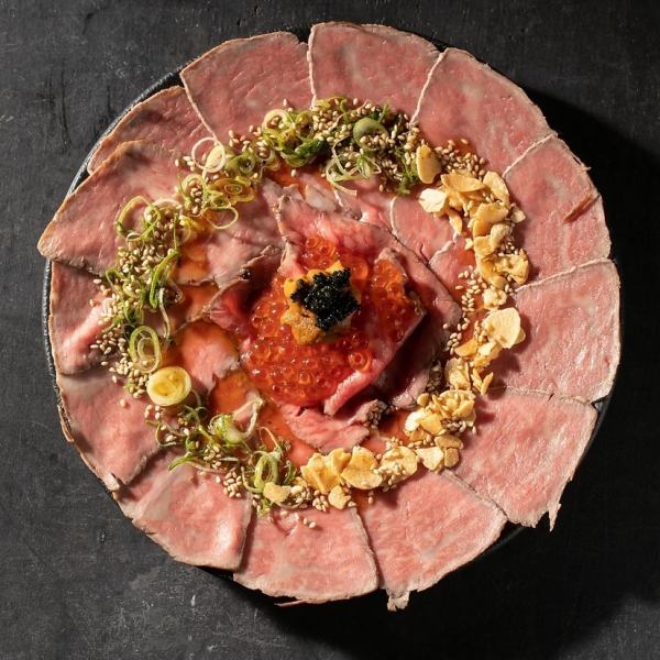 Melt-in-your-mouth rare roast beef with domestic sirloin and sea urchin salmon roe.