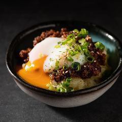 Meat miso potato salad topped with warm egg