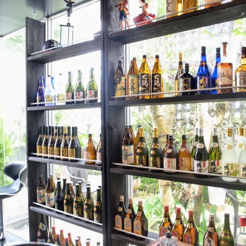 An abundant liquor × glass-filled interior with an open atmosphere