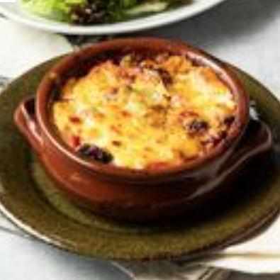 Wood-fired lasagna with seasonal vegetables and bolognese