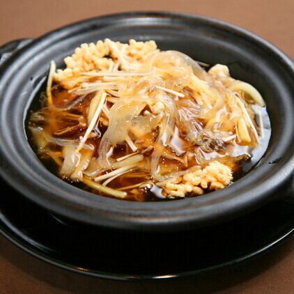 Shark fin with thickened sauce and scorched rice