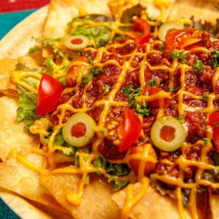 Mexican nachos (spicy snack of ground meat and beans)