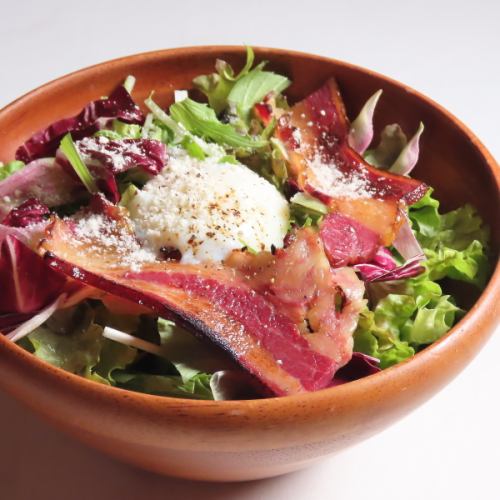 Caesar salad with roasted horse bacon and soft-boiled egg