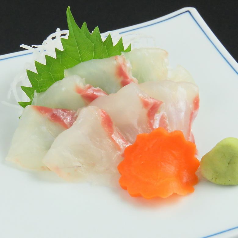 Live-killed red sea bream sashimi