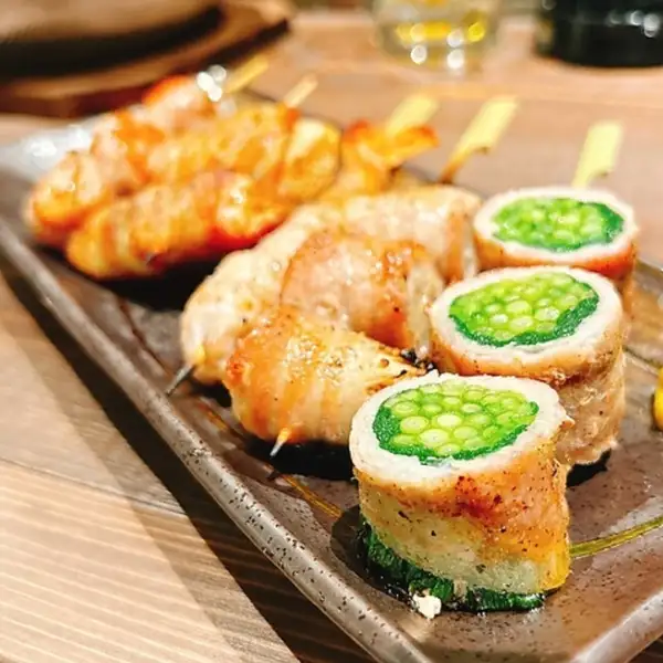 Hakata Vegetable Skewers - The delicious flavor of pork belly and the sweetness of seasonal vegetables are a perfect match.