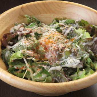 Caesar salad topped with soft-boiled egg