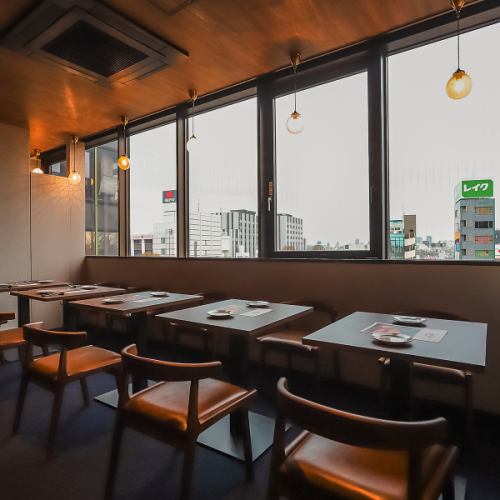 [An adult space with a view of the night cityscape]