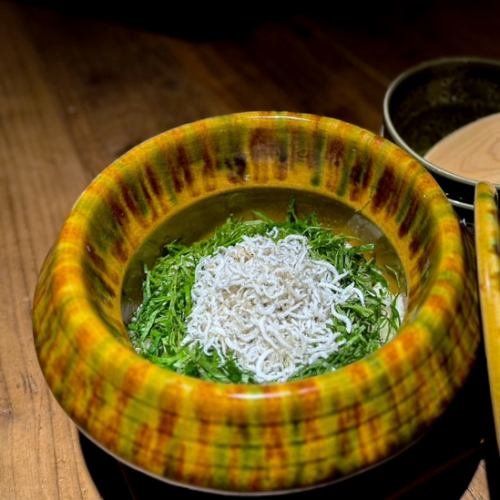 Rice cooked in a craftsman's earthenware pot is exceptionally delicious