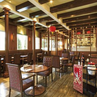 Bright and spacious table seating with sunlight streaming in.The food will taste even more special!