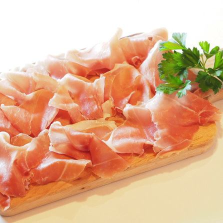Freshly cut prosciutto from Parma, Italy