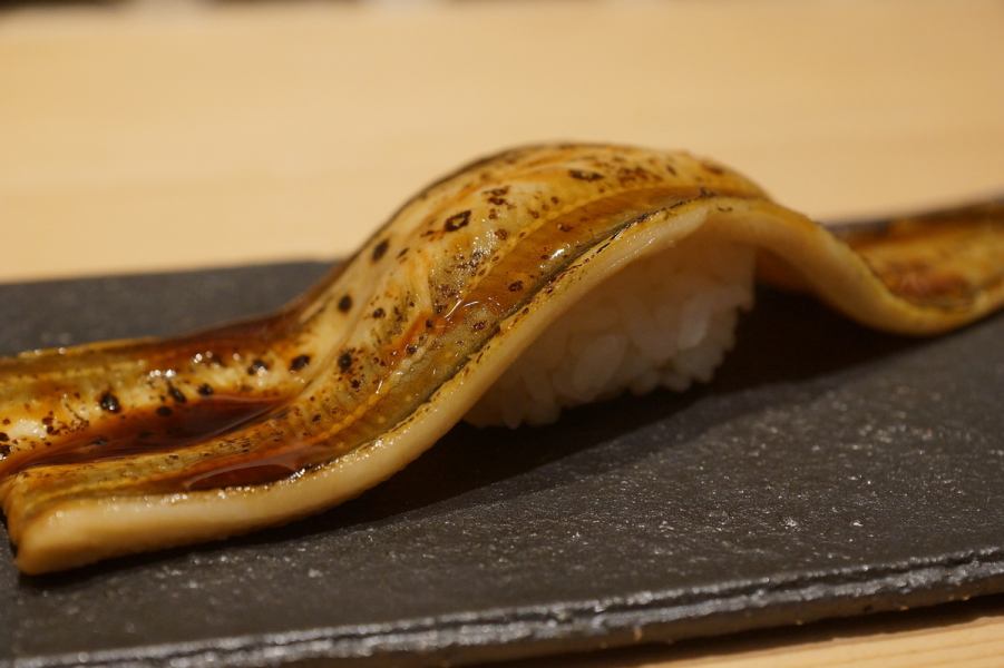 Extra-large conger eel sushi