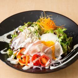 Caesar salad with hot spring eggs and prosciutto