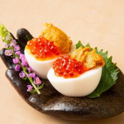 Sea urchin and egg with salmon roe