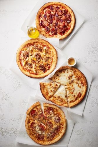 Charcoal-grilled chicken, corn, and egg teriyaki mayo pizza (second from the top of the photo)