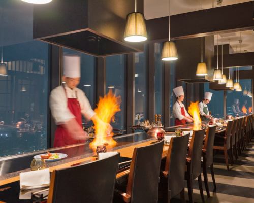 Impressive teppanyaki cooking right in front of your eyes