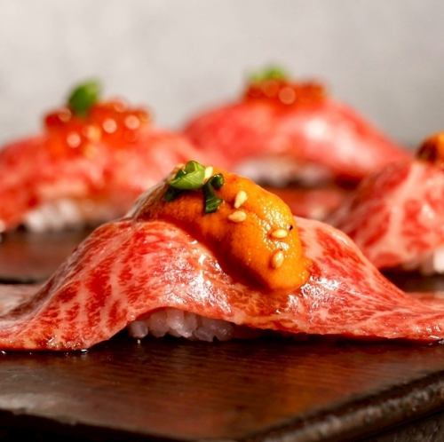 Wagyu beef sushi topped with sea urchin