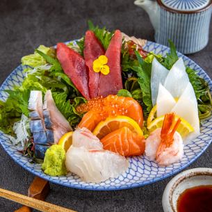 Five pieces of raw fish sashimi