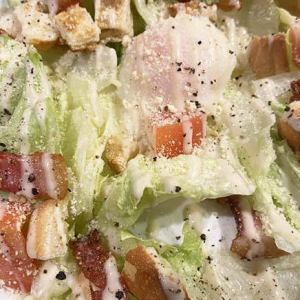 Caesar salad with bacon and soft-boiled egg