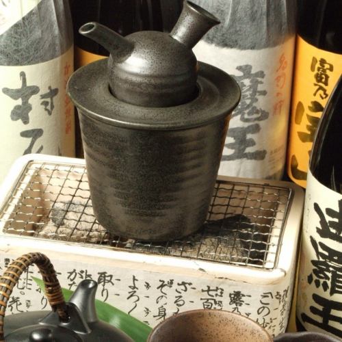 Warm sake with charcoal