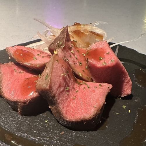Thickly sliced tender beef tongue with truffle sauce